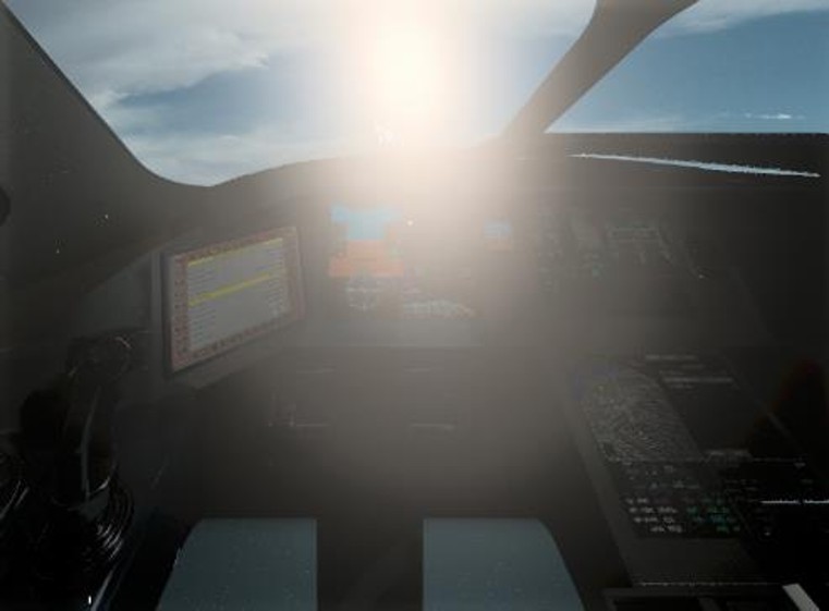 Sun positioned directly in the pilot's field of view, washing out the cockpit displays